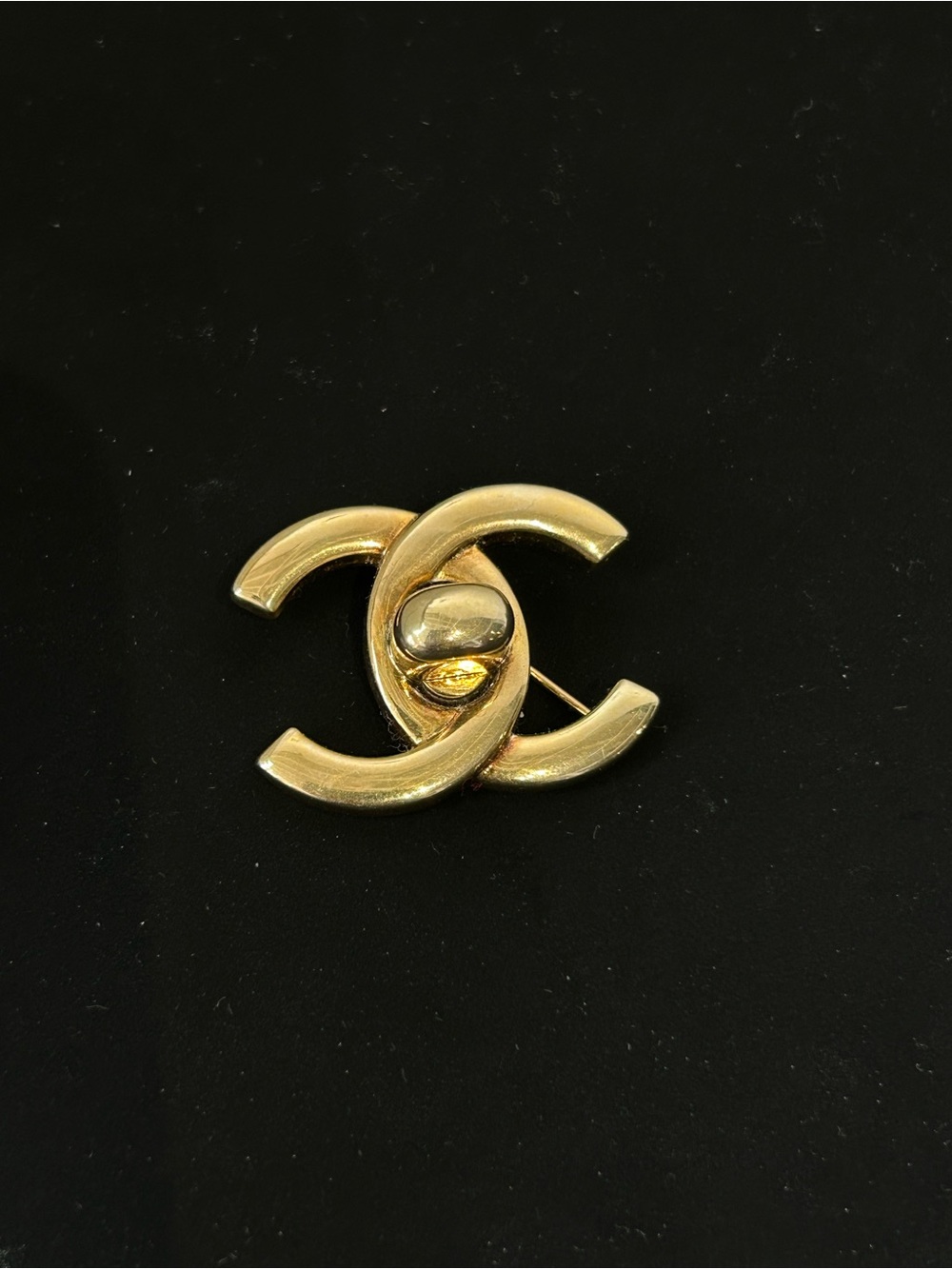 Chanel gold brooch